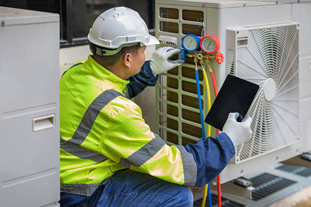 Professional Heat Pump Repair technician working in Henrico, VA